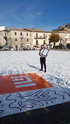 Altomonte, Francesco Caporale firma la tela da Guinnes World Record in Piazza San Francesco 53 Francesco Caporale