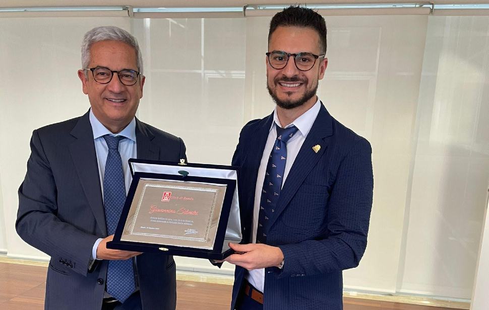 Manna con ricercatore