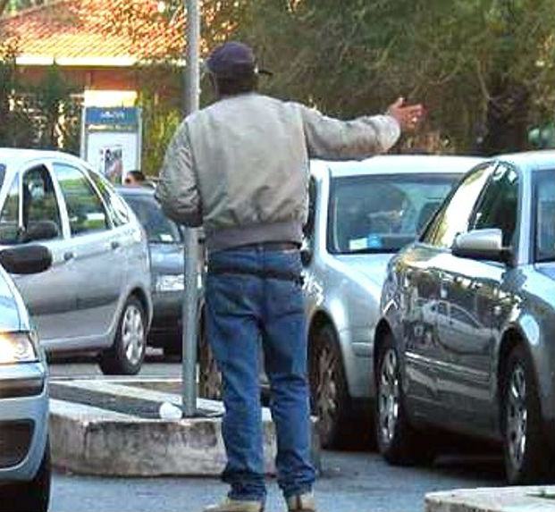 Parcheggiatori abusivi