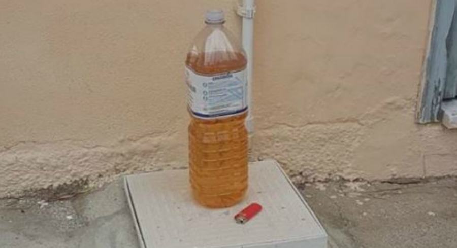 bottiglia benzina e accendino incoronato