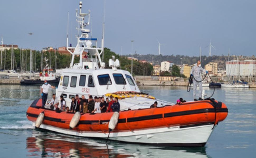 migranti 25